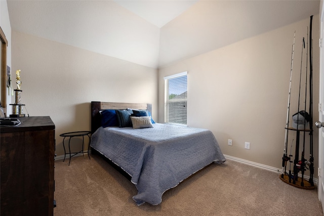 carpeted bedroom featuring vaulted ceiling