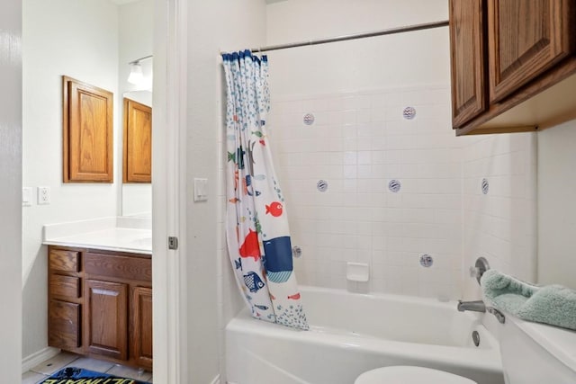 full bathroom with shower / tub combo, vanity, and toilet