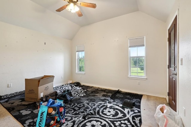 carpeted bedroom with lofted ceiling and ceiling fan