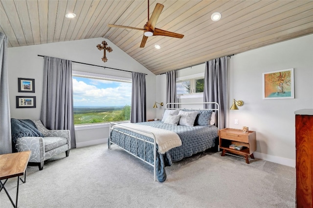 bedroom featuring ceiling fan, carpet flooring, wood ceiling, baseboards, and vaulted ceiling