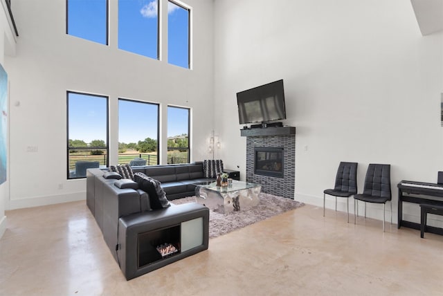 living room featuring a high ceiling