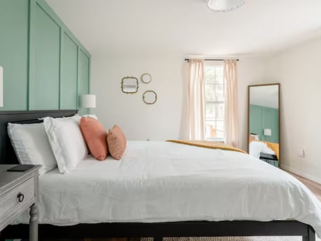 bedroom featuring hardwood / wood-style floors