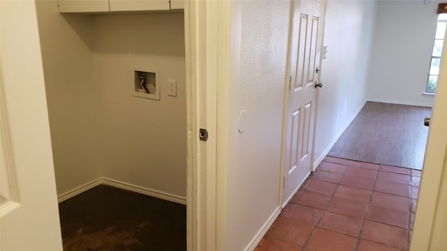 hallway with tile patterned flooring