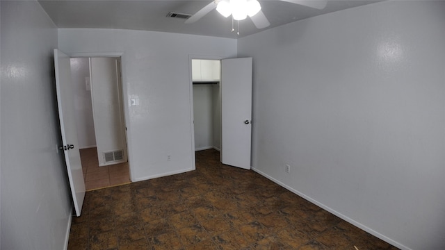 unfurnished bedroom featuring ceiling fan