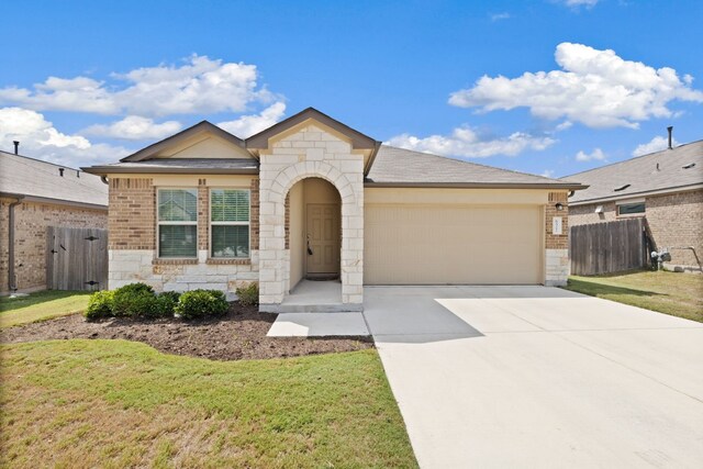 ranch-style house with a front lawn and a garage