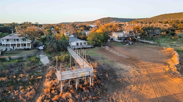 birds eye view of property with a mountain view