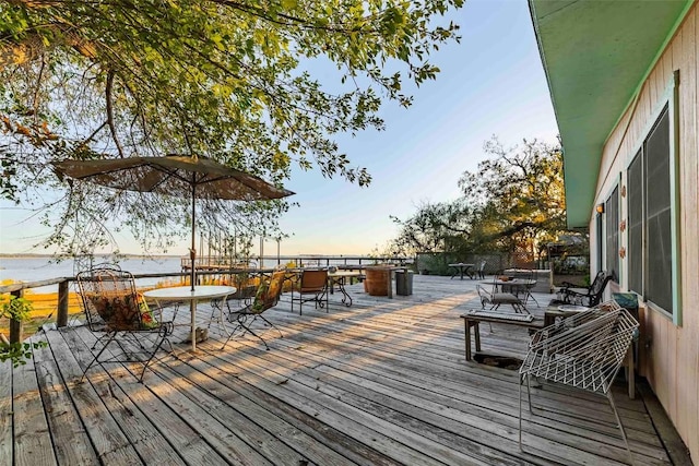 deck at dusk with a water view