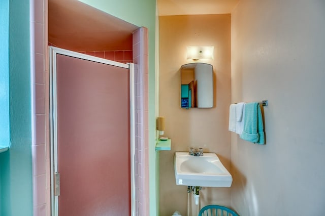 201 Lakewood Dr, Burnet, TX 78611 - bathroom with a sink and a shower stall