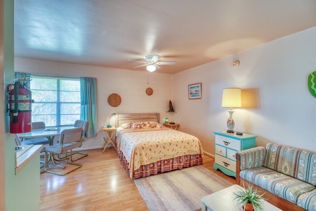 201 Lakewood Dr, Burnet, TX 78611 - bedroom featuring light wood-type flooring and ceiling fan