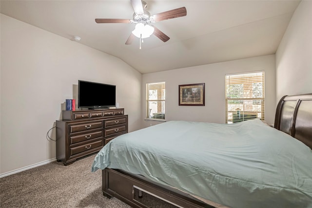 carpeted bedroom featuring vaulted ceiling and ceiling fan