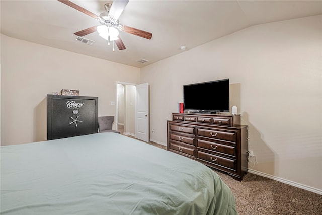 carpeted bedroom featuring lofted ceiling and ceiling fan