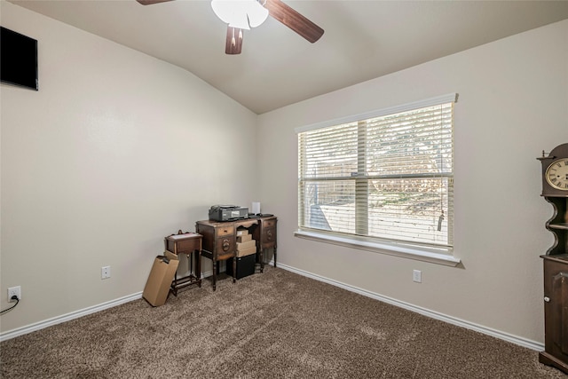 office space featuring lofted ceiling, carpet flooring, and ceiling fan