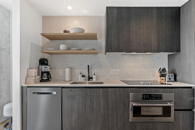 48 E Ave Unit 1405, Austin, TX 78701 - kitchen with appliances with stainless steel finishes, modern cabinets, light countertops, decorative backsplash, and open shelves