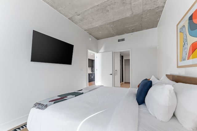 bedroom with light wood-type flooring