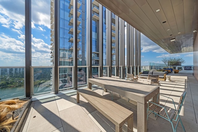 view of patio featuring a water view