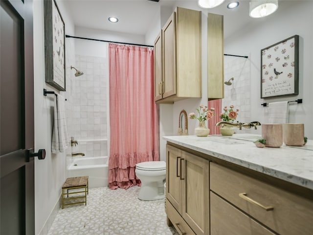 full bathroom featuring tile patterned floors, vanity, toilet, and shower / bath combo with shower curtain