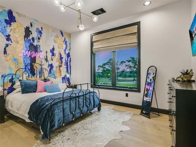 bedroom with light wood-type flooring