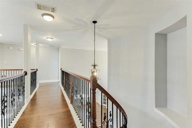 corridor featuring dark hardwood / wood-style floors