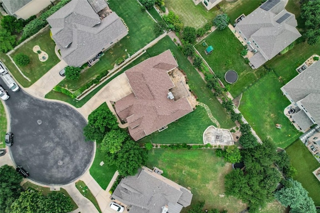 aerial view of property and surrounding area with nearby suburban area