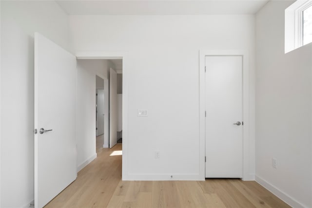 unfurnished bedroom with light hardwood / wood-style flooring