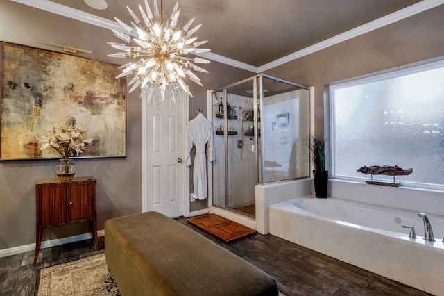 bathroom featuring a notable chandelier, wood-type flooring, shower with separate bathtub, and ornamental molding