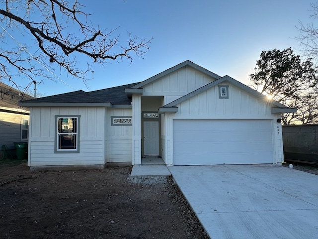 ranch-style home with a garage