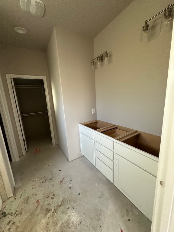 bathroom featuring concrete floors