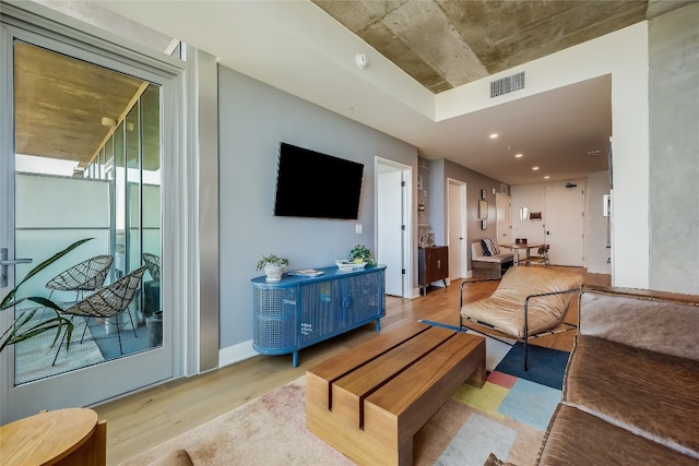 living room with light hardwood / wood-style floors