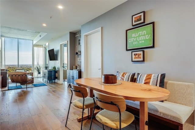 dining space featuring hardwood / wood-style floors