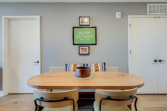 dining space featuring light hardwood / wood-style flooring