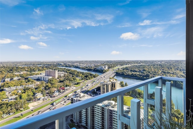 balcony featuring a water view