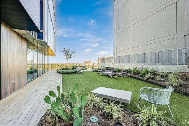 view of yard featuring a wooden deck