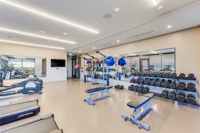 workout area featuring concrete floors