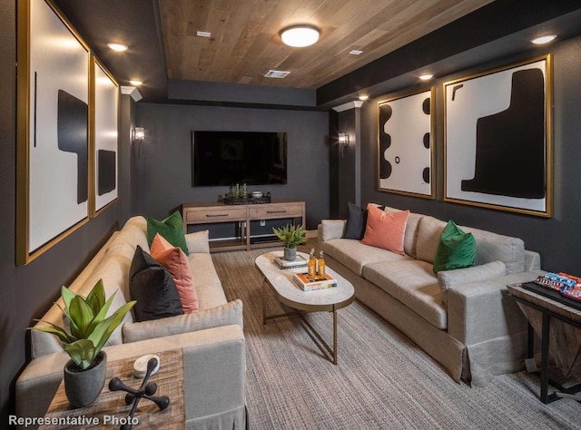 cinema room featuring wooden ceiling