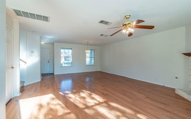 unfurnished living room featuring ceiling fan and light hardwood / wood-style floors