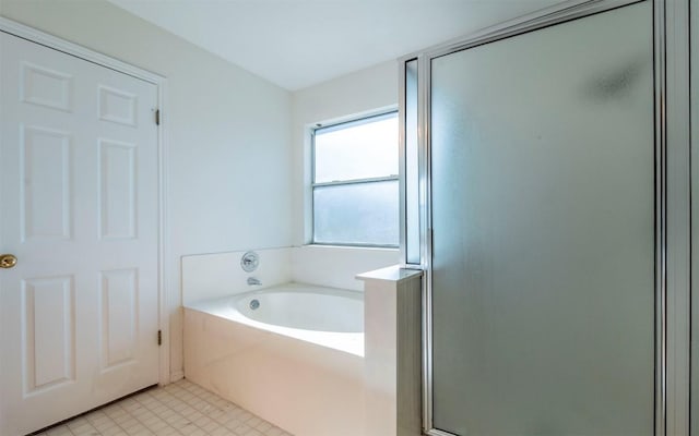 bathroom with separate shower and tub