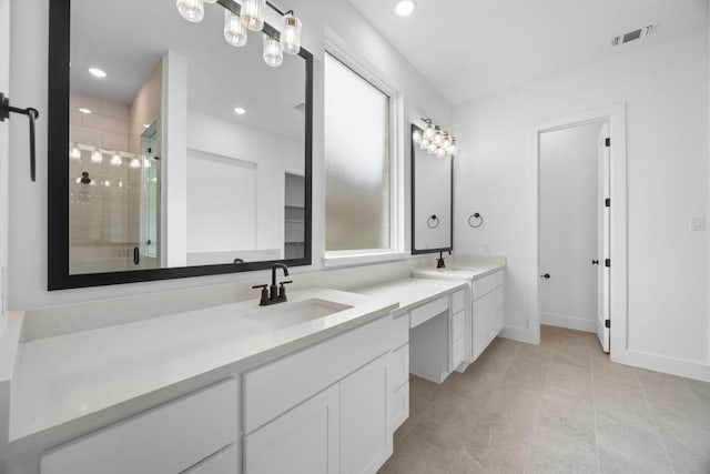 full bath with visible vents, baseboards, a shower stall, recessed lighting, and vanity