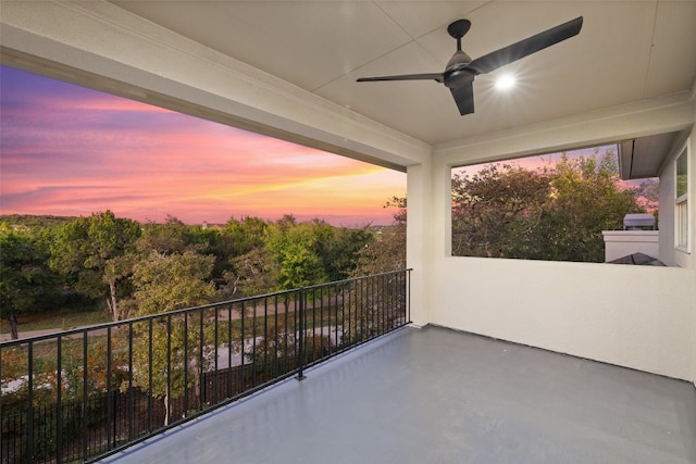 balcony at dusk with ceiling fan