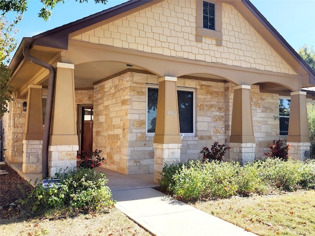 entrance to property with a porch