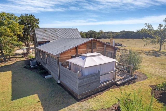 birds eye view of property featuring a rural view