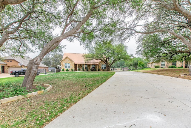 ranch-style home with a front yard