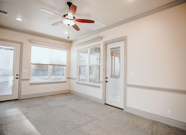 interior space with visible vents and a ceiling fan