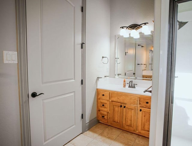 bathroom with vanity and tile patterned floors