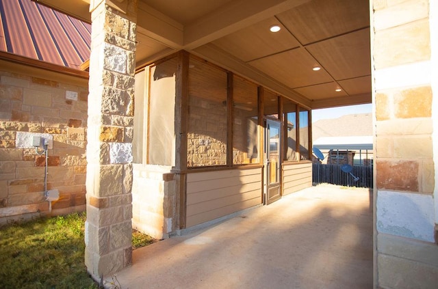 exterior space with metal roof