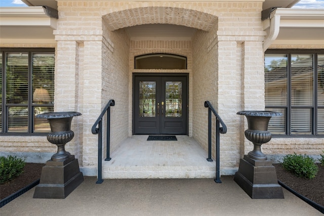 property entrance featuring french doors