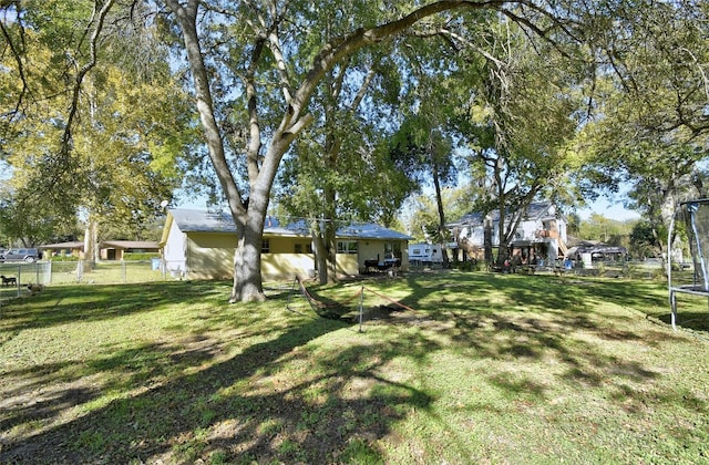 view of yard featuring a trampoline