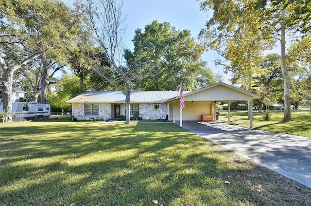 single story home featuring a front lawn and a carport