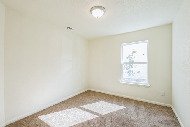 empty room with carpet floors