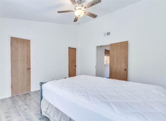 bedroom featuring ceiling fan and light wood-type flooring