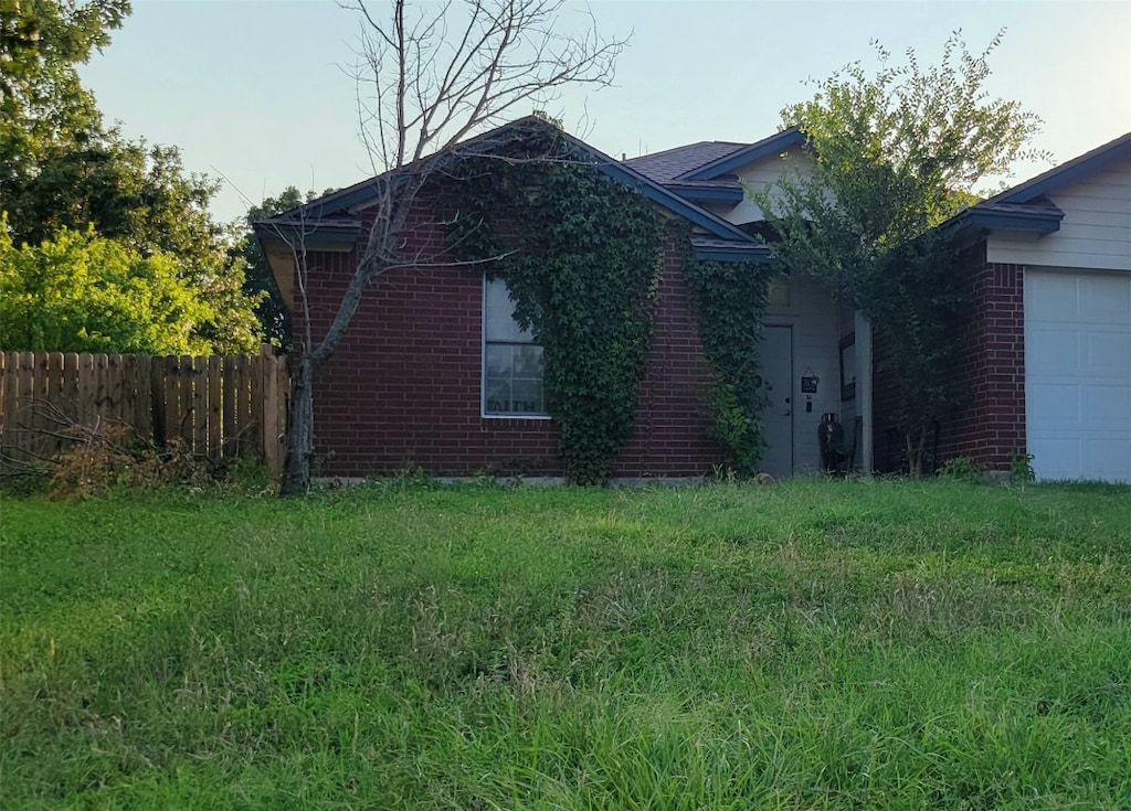 view of side of home with a garage